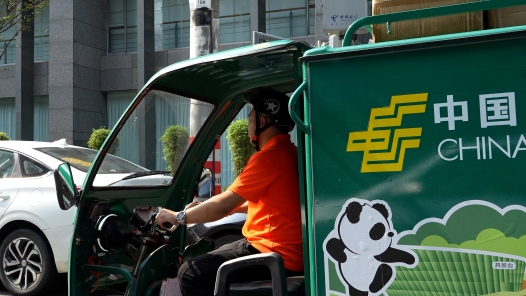 劳模故事·四川劳模丨周洋：用心服务，践行人民邮政为人民的服务宗�? title=
